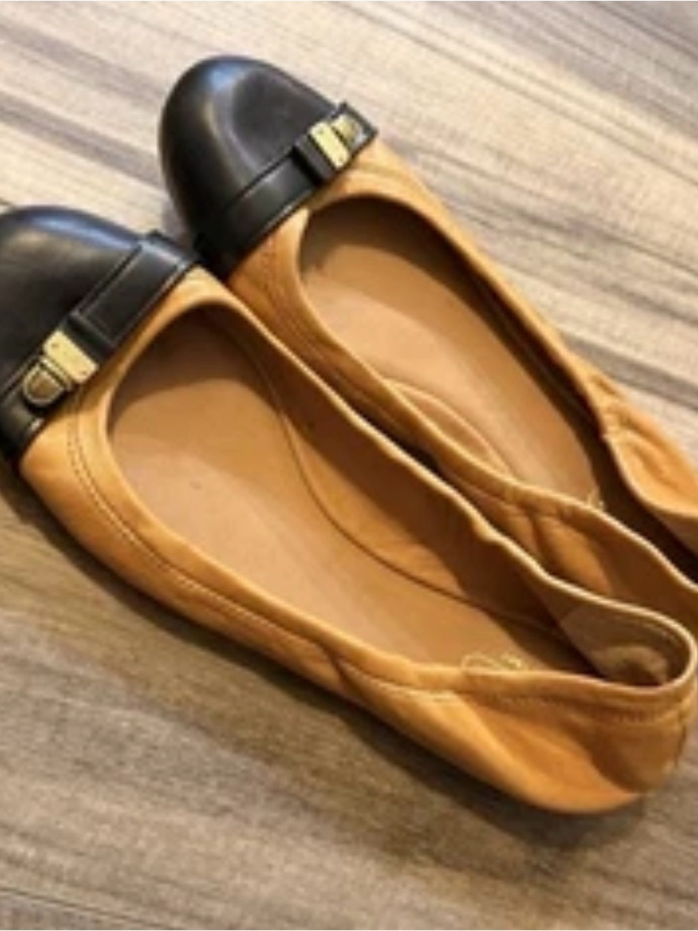 Coach Two-Tone Leather Ballet Flats in Tan and Black with Gold Accent